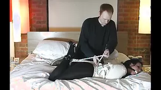 Man Breaks Into A Sleeping Room And Ties A MILF Down