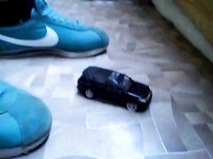 Girl In … Sneakers Crushes Toy Car